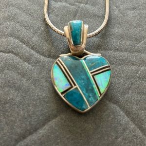 Kenneth Bitsie sterling heart pendant necklace w inlaid stones.